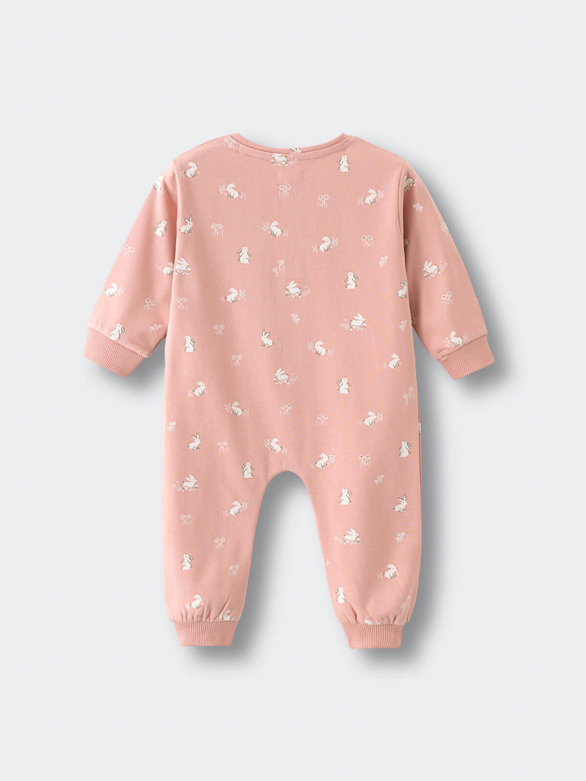 Pink baby onesie with white rabbit pattern and ribbed cuffs laid flat Sweatshirt Onesie - Meadow Friends Blush Baby girl