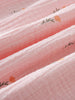 Close-up of pink fabric with floral embroidery Amara Dress - Poppy Field Girls