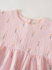 Pink dress with floral patterns on a white background Amara Dress - Poppy Field Girls