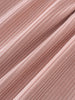 Close-up of corduroy pink fabric texture