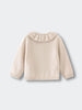 Beige sweater with a ruffled collar on a light gray background Baby Ruffle Cardigan - Ecru Baby girl