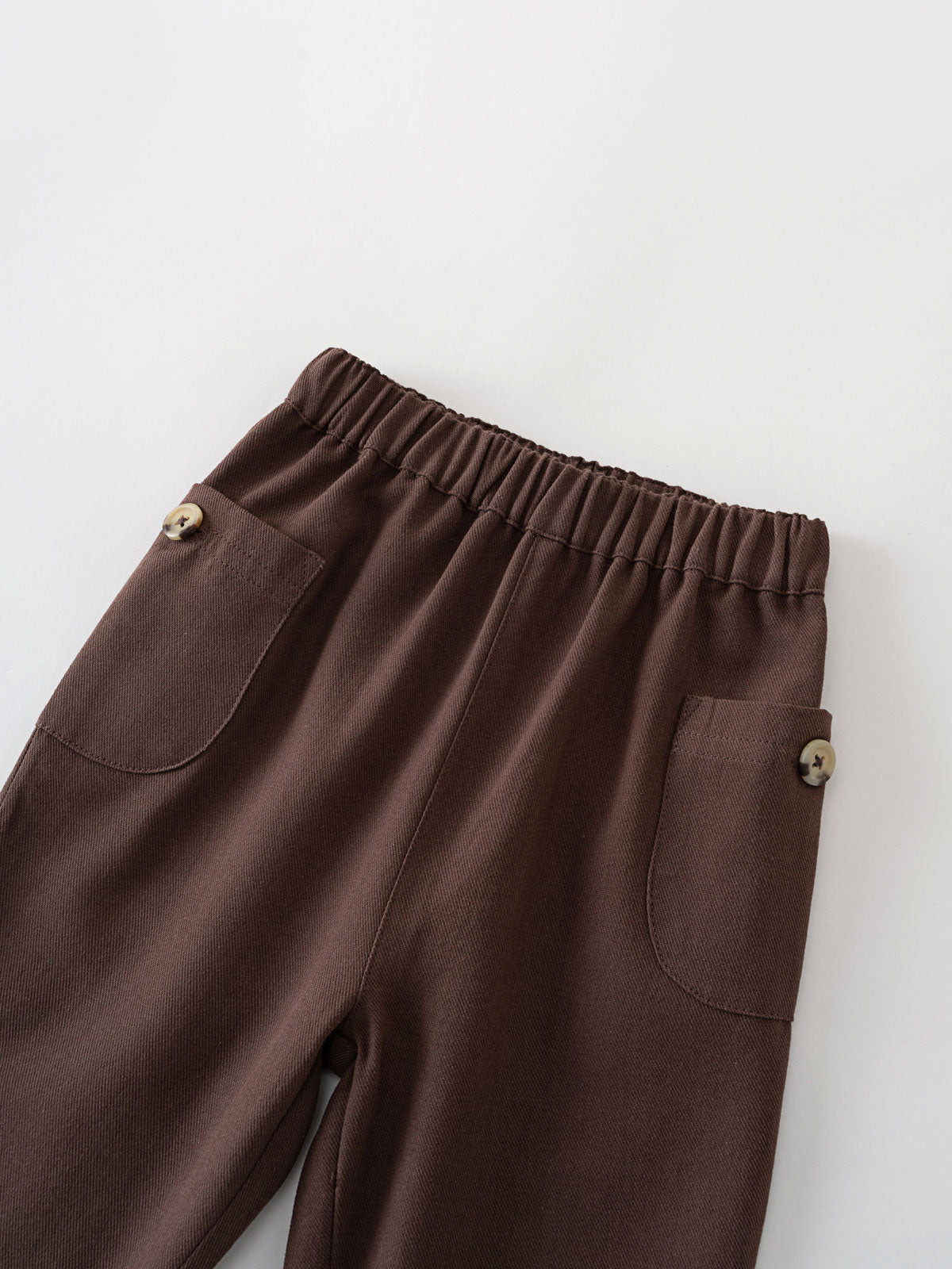 Brown pants with elastic waistband and front pockets with button details Baby Twill Pants - Spruce Baby boy