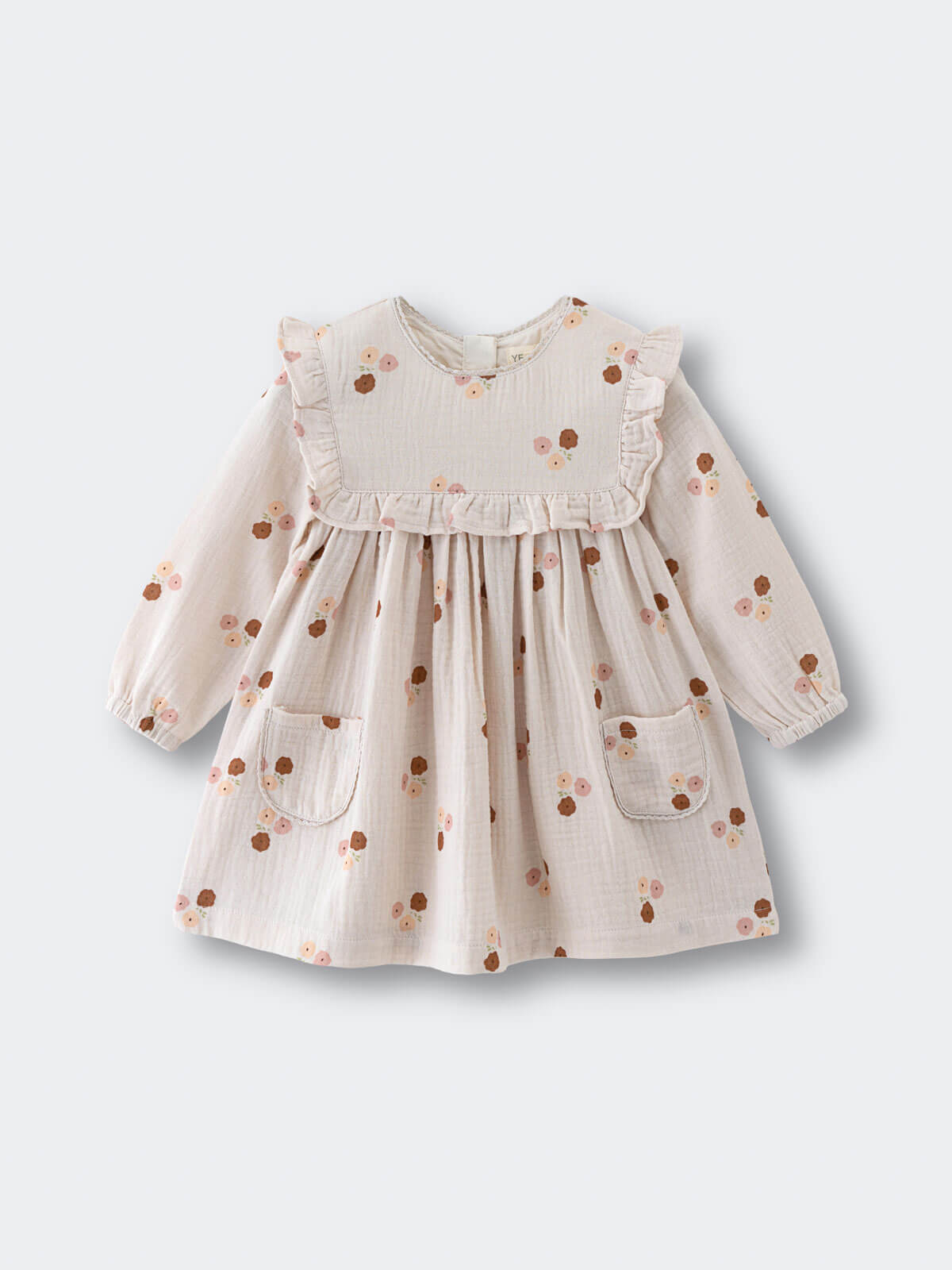 Baby dress with floral pattern on a light gray background