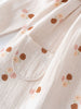 Floral patterned dress with a pocket on a light background