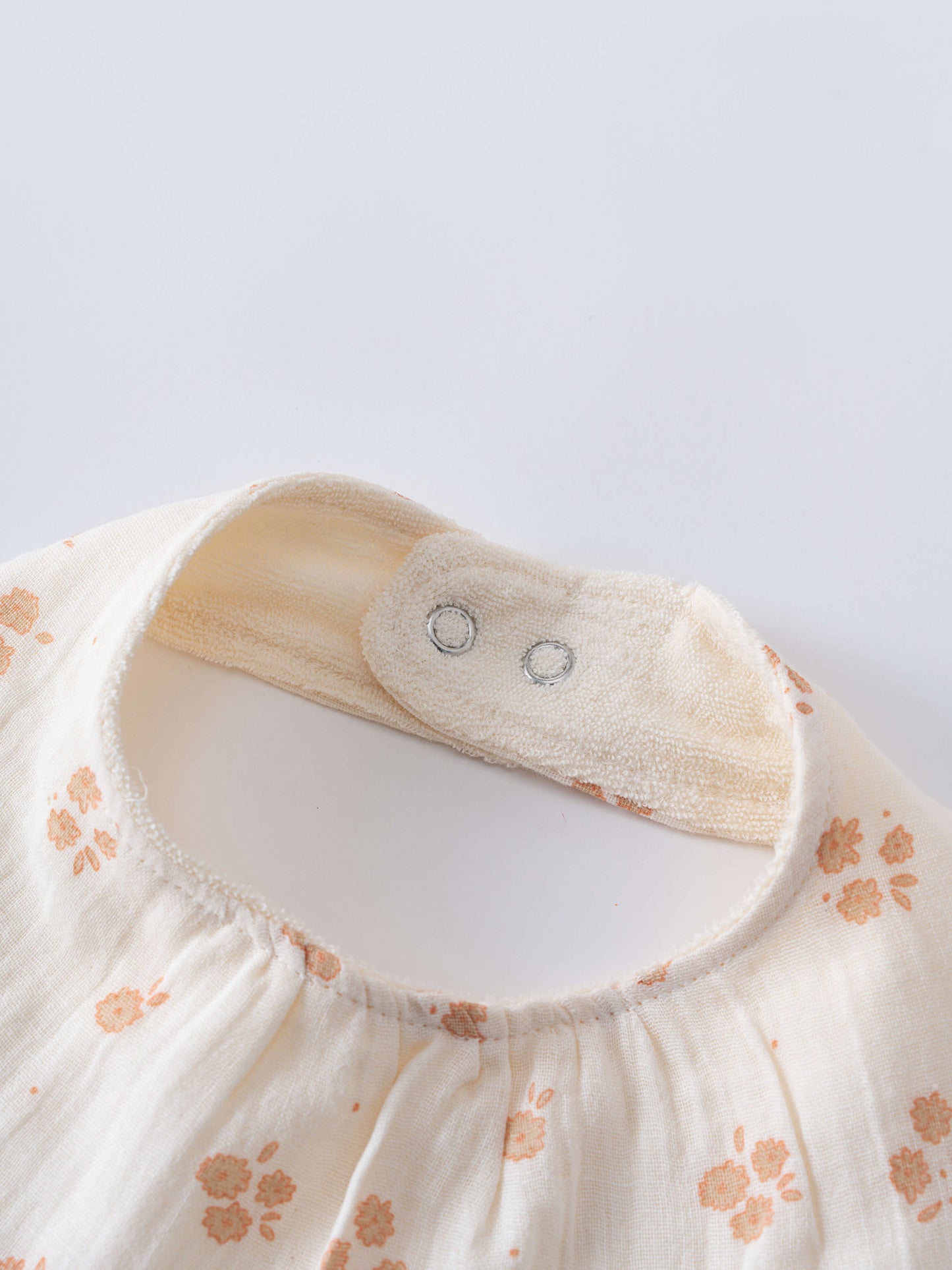 Baby bib with floral pattern and wooden clip on a light gray background Bandana Bibs 3 Pack - Petal Paws Baby girl