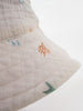 Close-up of natural muslin bucket hat with small sealife designs Bucket Hat - Dolphin Fun Girls