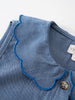 Close-up of blue chambray fabric with contrast stitching and button detail Chambray dress - Blue Chambray Girls