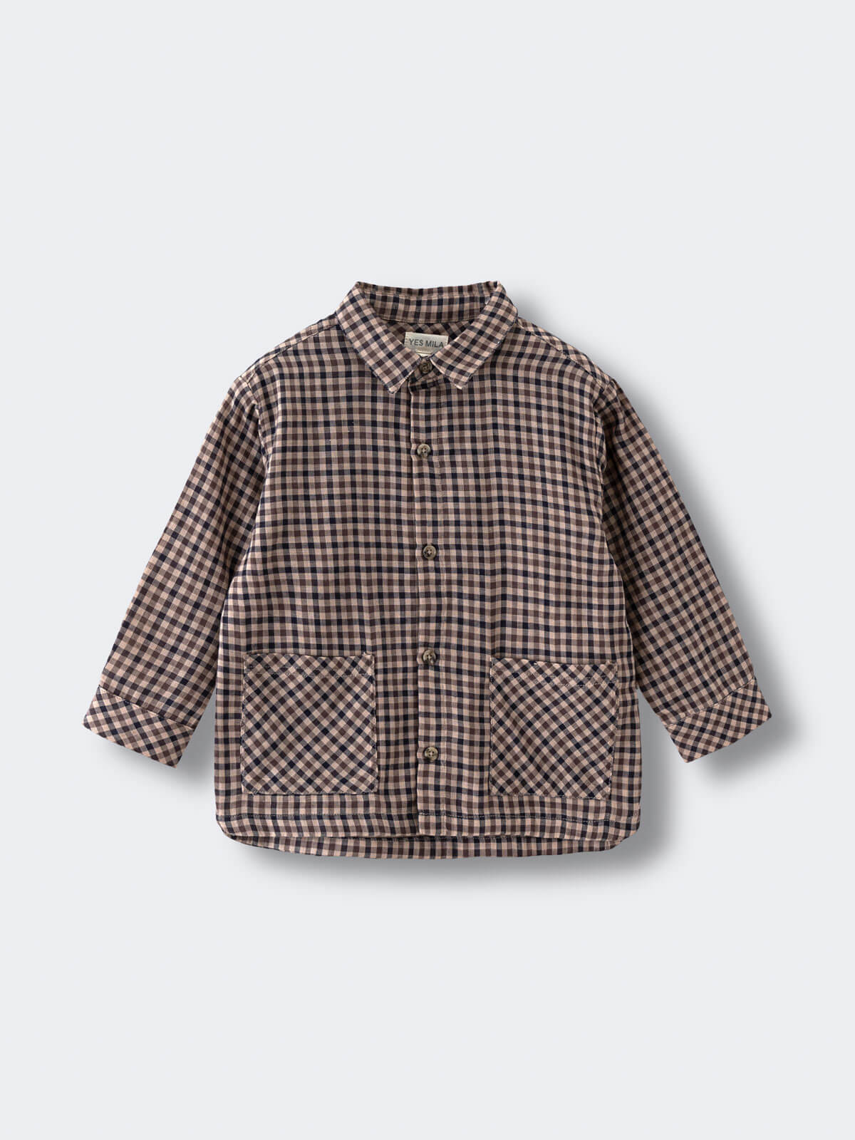 Plaid shirt on a light gray background