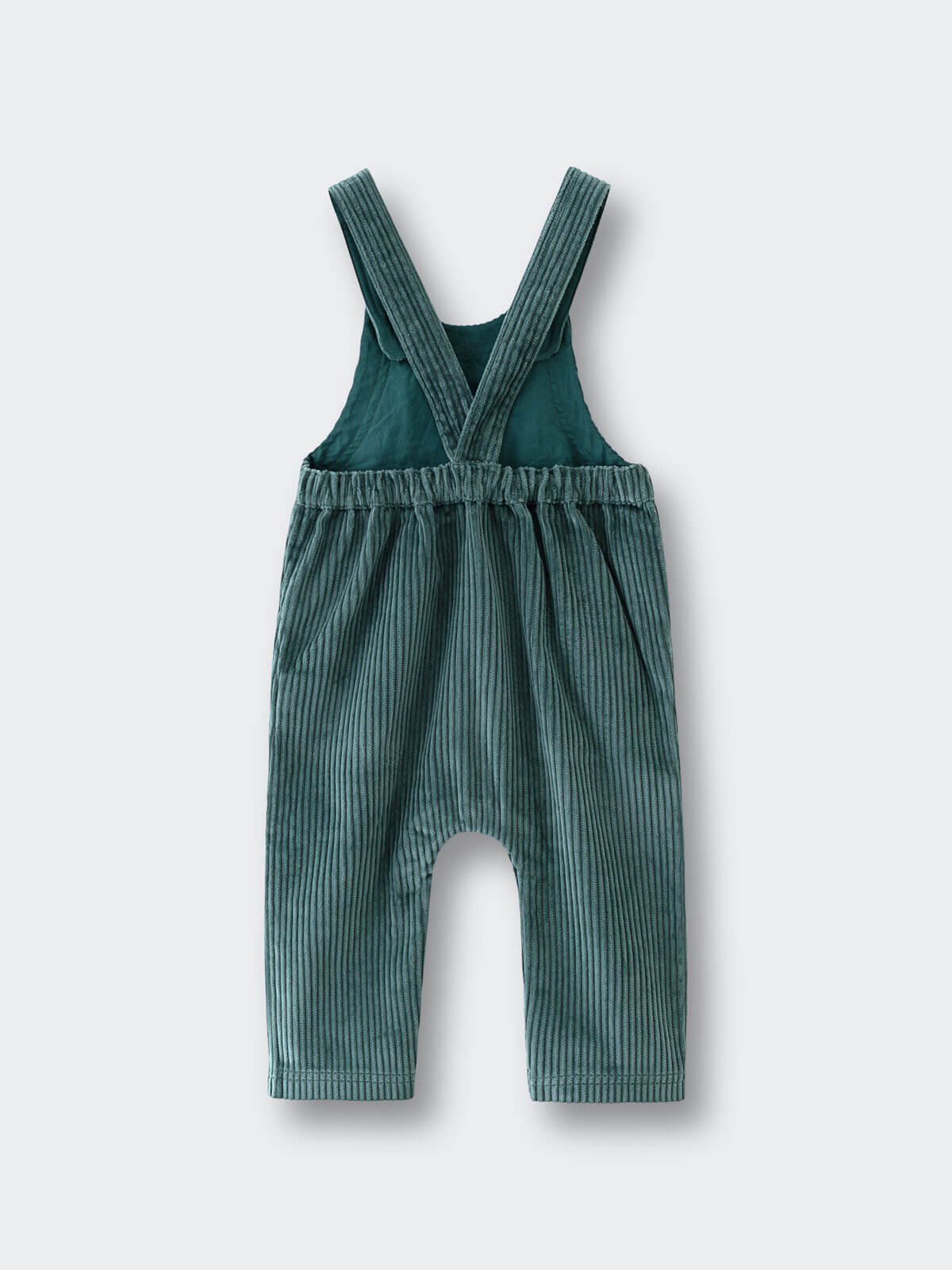Green corduroy overalls on a white background