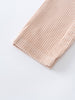 Beige corduroy overalls on a white background