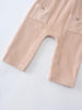 Beige corduroy overalls on white background