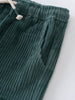 Close-up of green corduroy pants on a white background Corduroy Pants - Balsam Girls and Boys