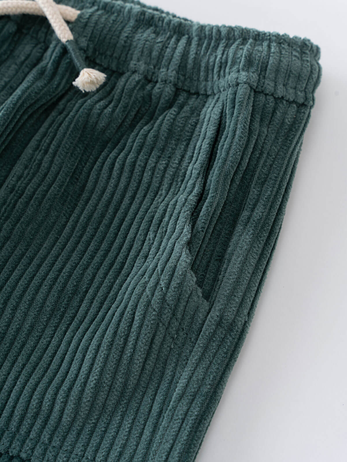 Close-up of green corduroy pants on a white background Corduroy Pants - Balsam Girls and Boys
