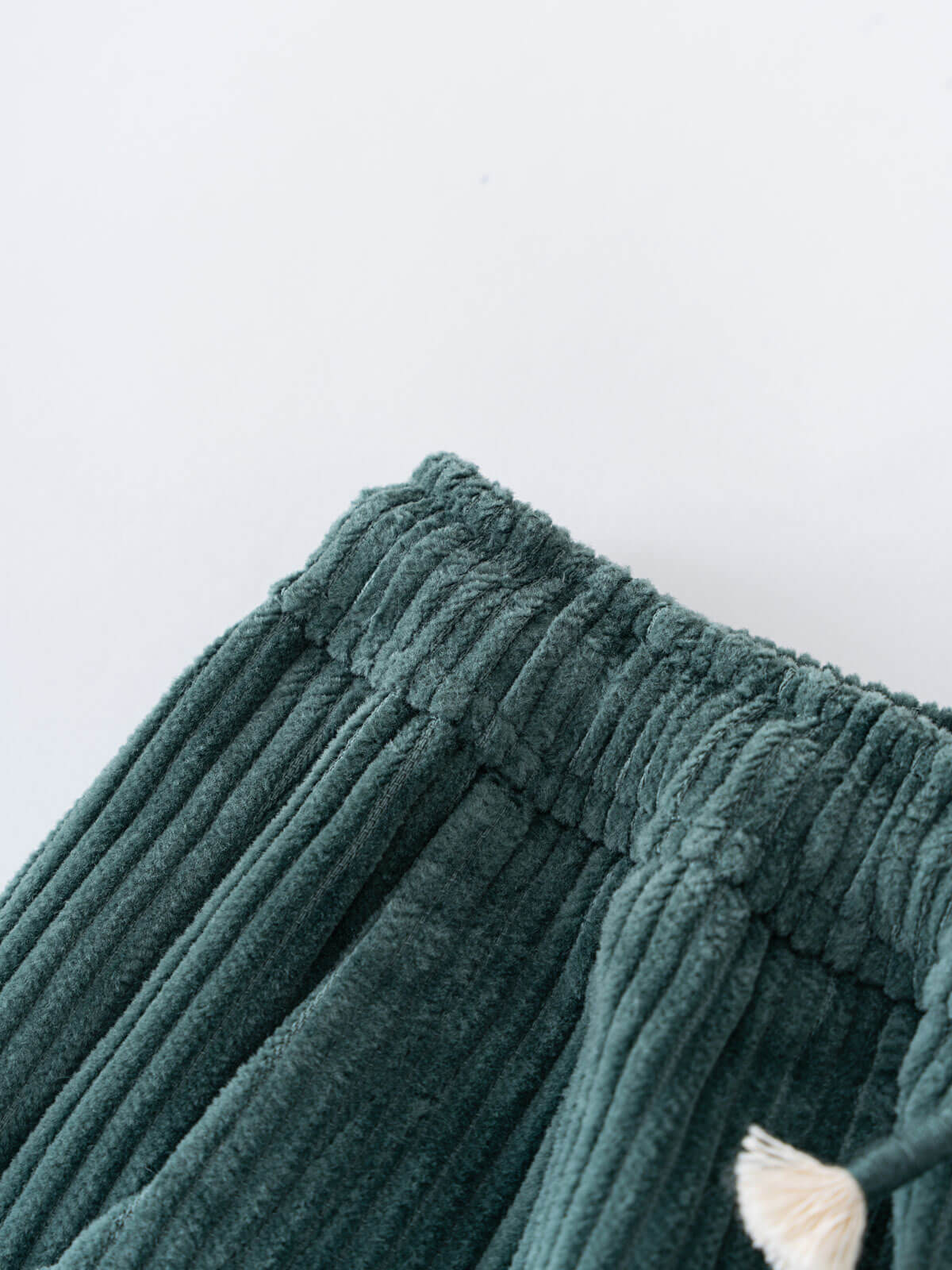 Close-up of green fleece pants with a white background Corduroy Pants - Balsam Girls and Boys