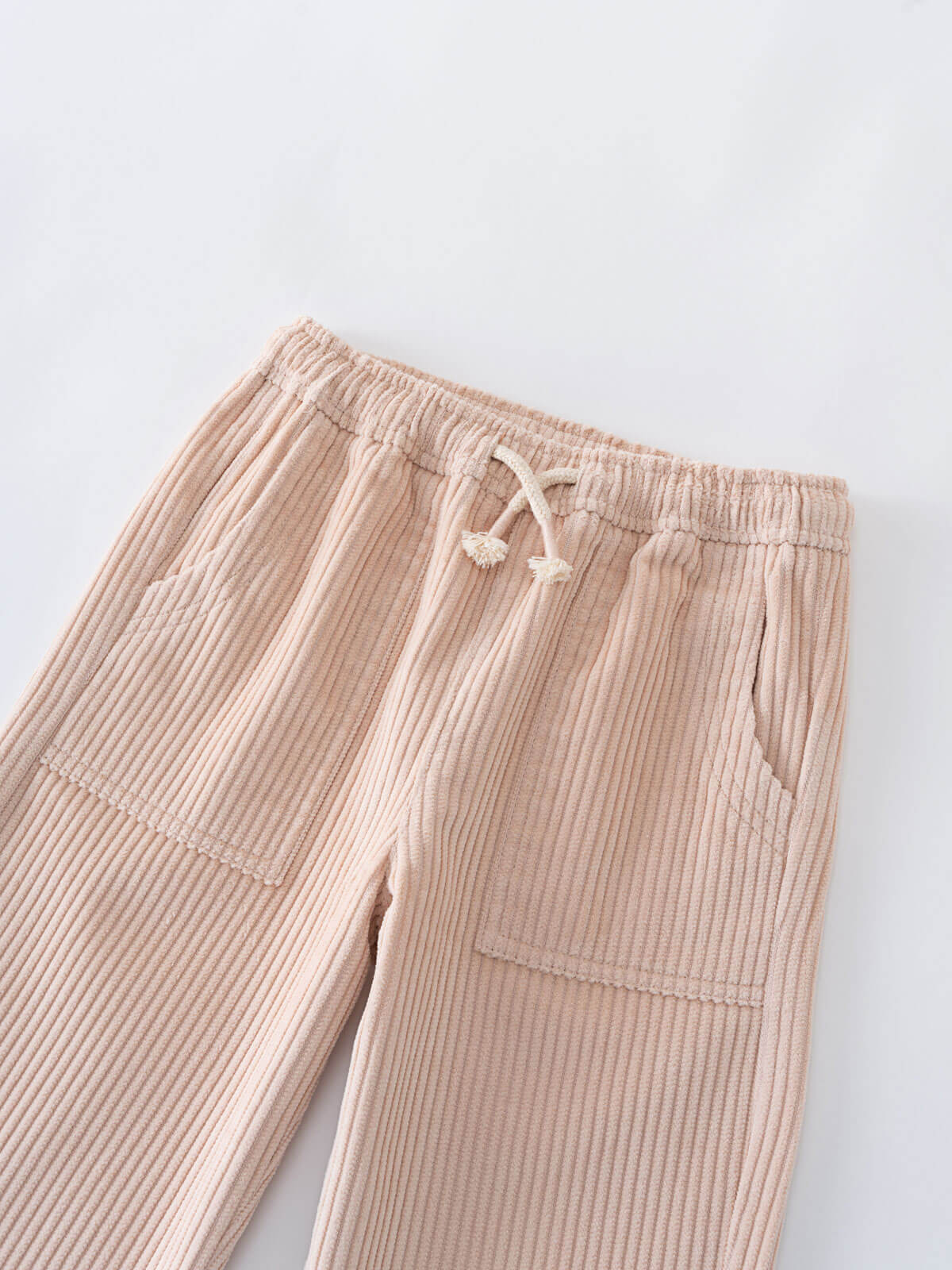 Beige corduroy pants with a drawstring on a light gray background Corduroy Pants - Clay Girls and Boys
