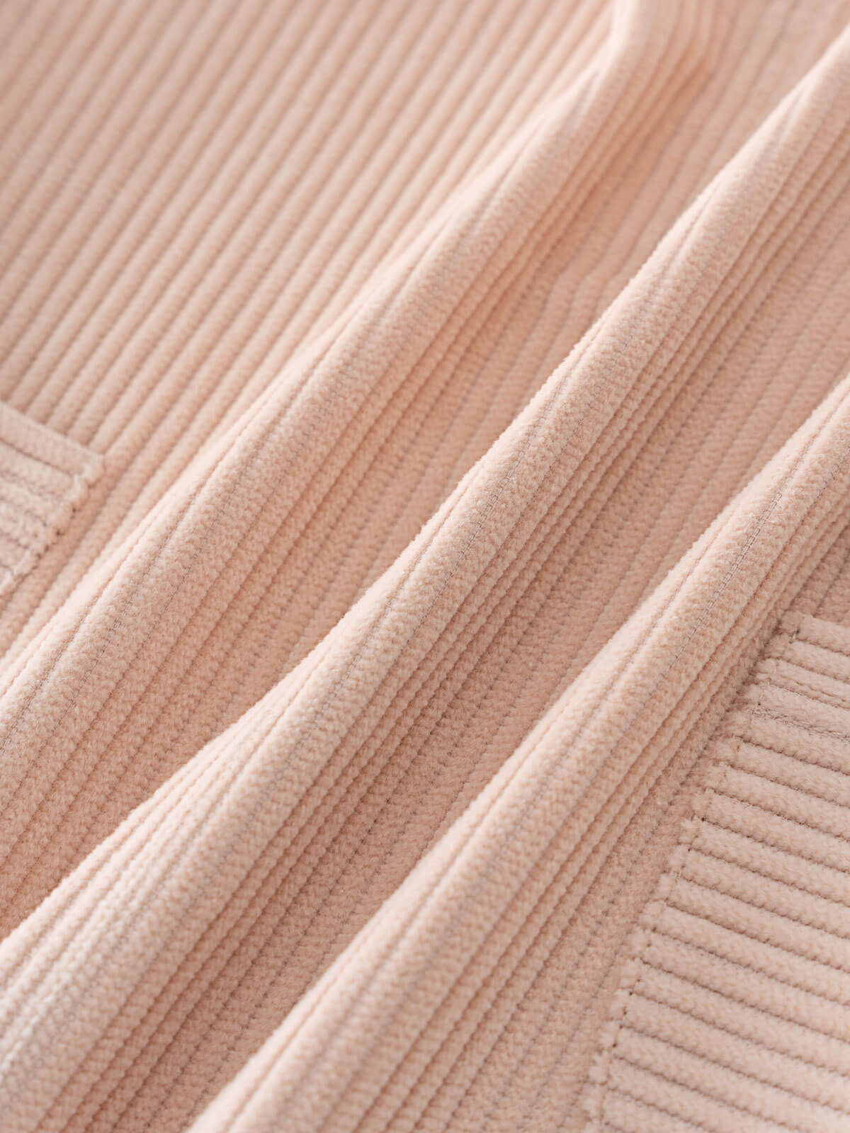 Close-up corduroy pinafore dress fabric texture in beige color Corduroy Pinafore Dress - Clay Girls
