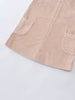 Close-up of a beige corduroy pinafore dress with two front pockets on a light gray background Corduroy Pinafore Dress - Clay Girls