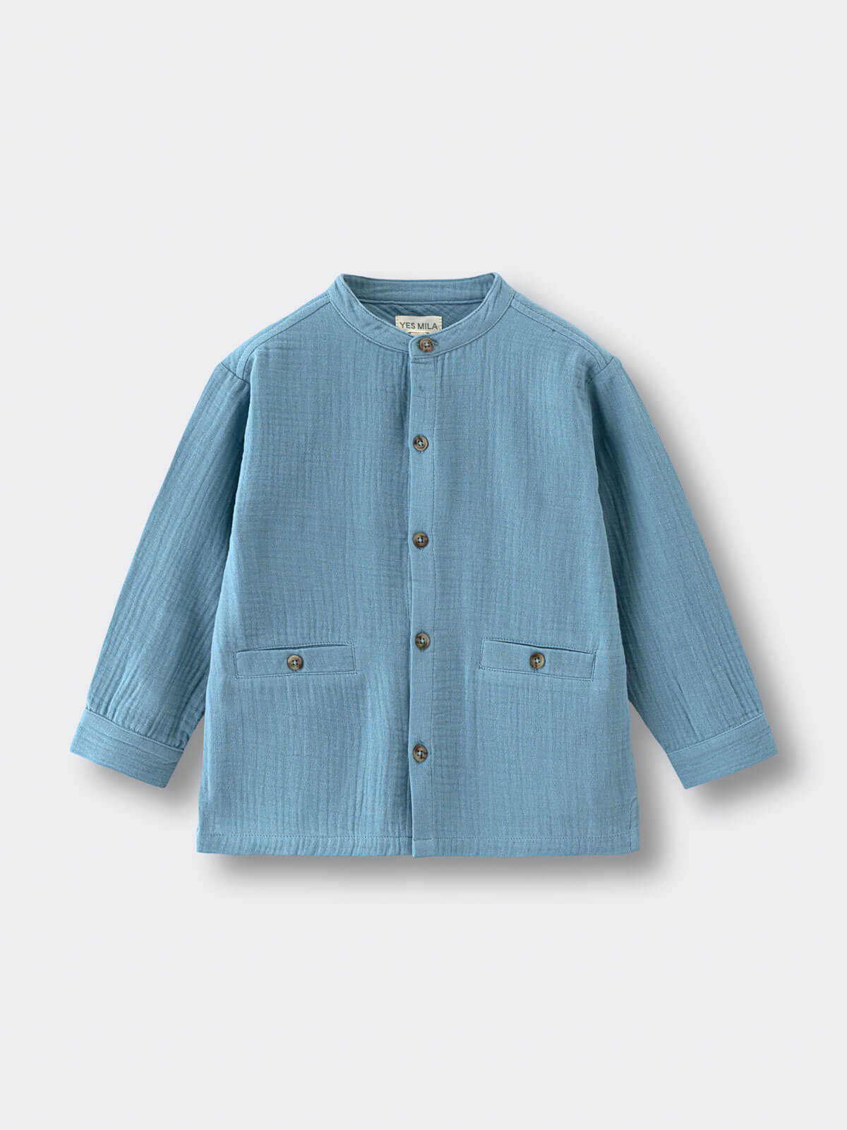 Blue children's jacket on a light gray background Grandad Shirt - Lake Blue Boys