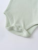 Close-up of a light green ribbed bodysuit with snap buttons at the crotch Henley Short Sleeve Bodysuit - Matcha Baby boy