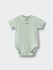 Light green ribbed baby bodysuit with two brown buttons at the neckline Henley Short Sleeve Bodysuit - Matcha Baby boy