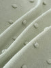 Close-up of a mint knitted jumper with textured bobble details Knit Jumper - Mint Girls