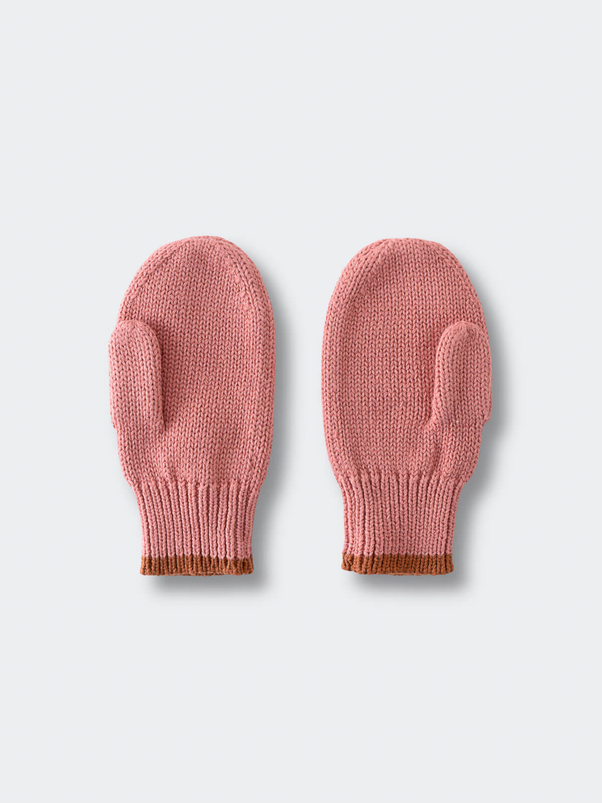 Pair of pink knitted mittens on a light gray background Knit Mittens - Rosehip Girls