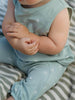 Baby in light blue outfit sitting on a striped surface Leo Romper - Summer Time Baby boy