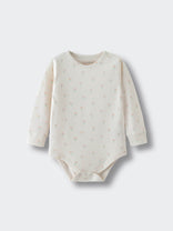 Cream-colored baby bodysuit with small floral print pattern on light background Long Sleeve Bodysuit - Spring Bloom Baby girl