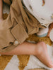 Child wearing tan shorts with button cuff detail and white embroidered shirt Luca Shorts - Biscuit Boys