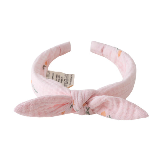 Pink fabric headband with floral print and tied bow detail Muslin Headband - Poppy Field Girls