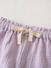 Close-up of elastic waistband with cream drawstring on lilac crinkled fabric shorts Muslin Shorts - Lilac Girls