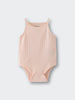 Light pink ribbed knit baby bodysuit with thin straps and snap closures Pointelle Singlet Bodysuit - Shell Pink Baby girl