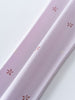 Close-up of pale purple fabric with small rust-colored floral embroidery details printed Leggings - Spring Love Girls