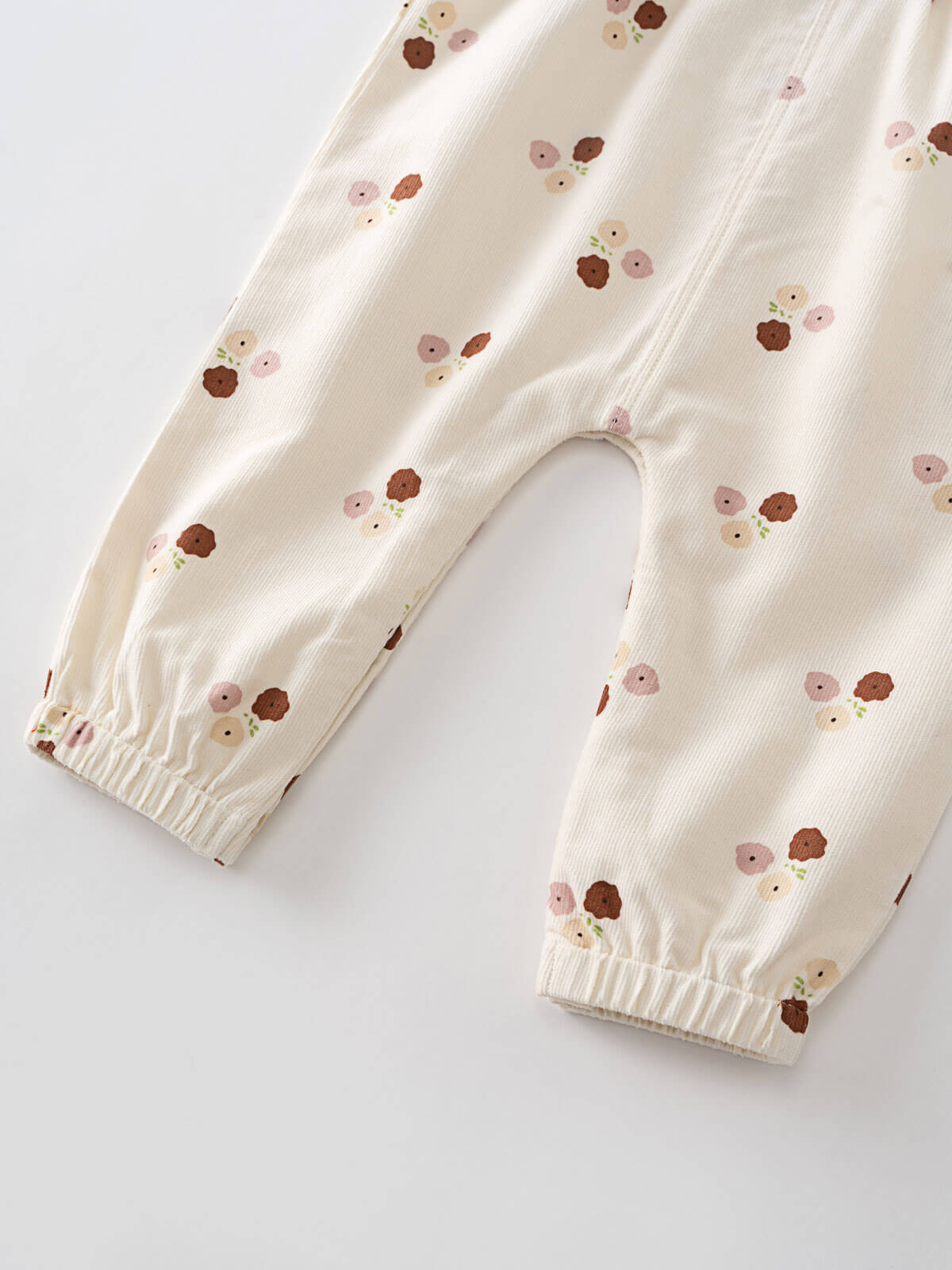 Baby beige overalls with floral patterns on a light background Printed Overalls - Autumn Bouquet Ecru Baby girl