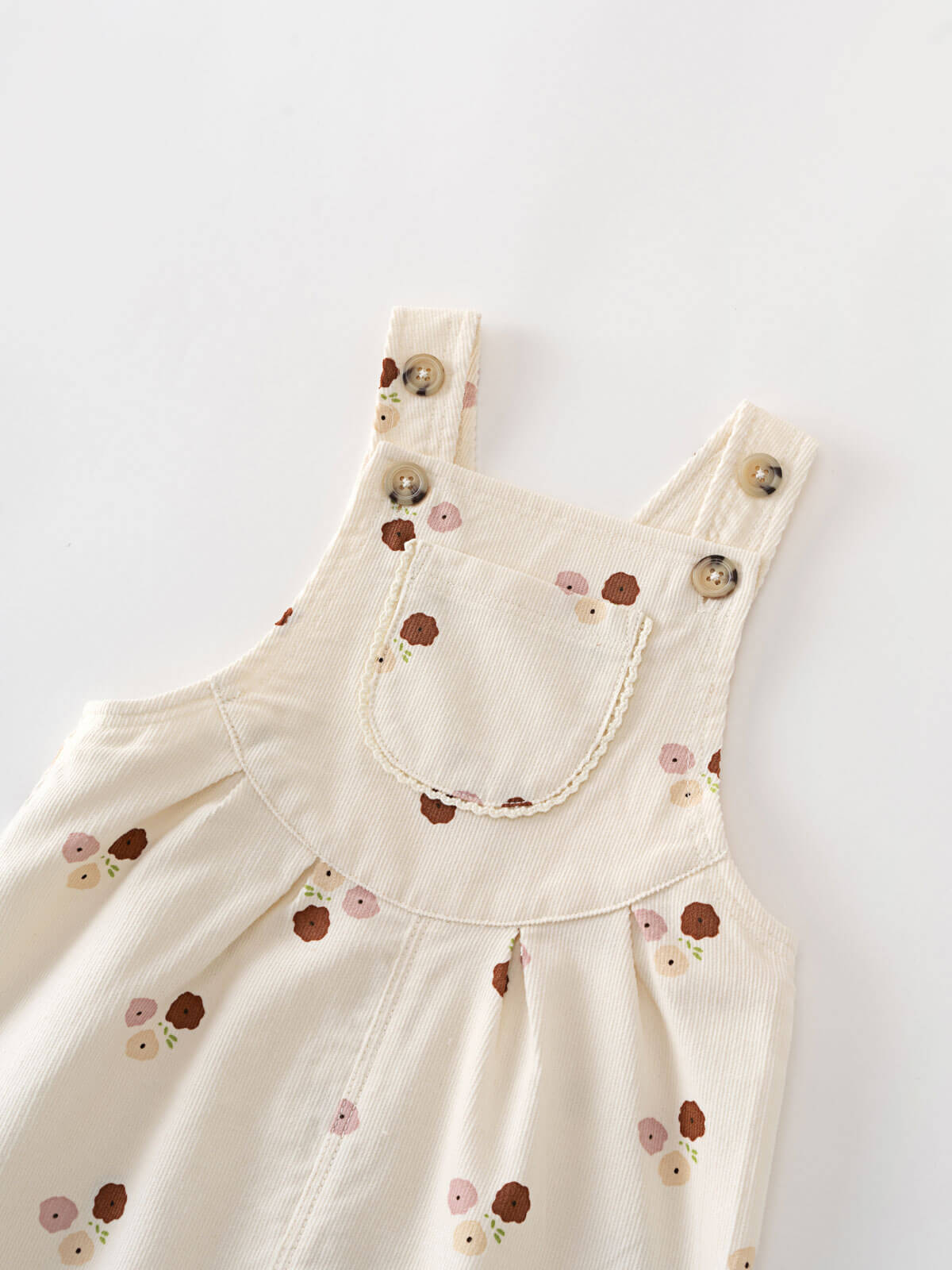 Beige overalls with floral patterns on a white background Printed Overalls - Autumn Bouquet Ecru Baby girl