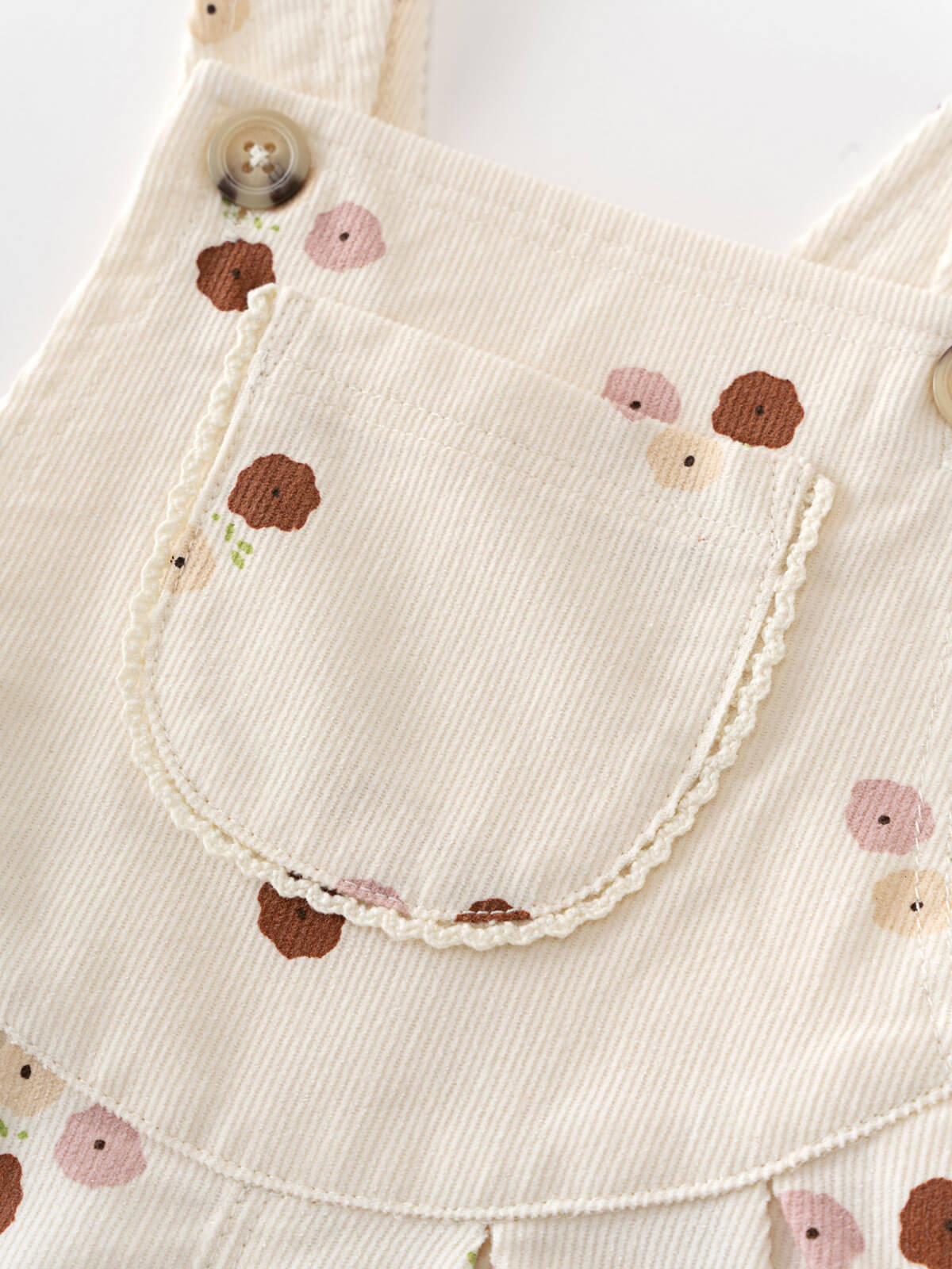 Close-up of a baby overalls with floral patterns on a plain background Printed Overalls - Autumn Bouquet Ecru Baby girl