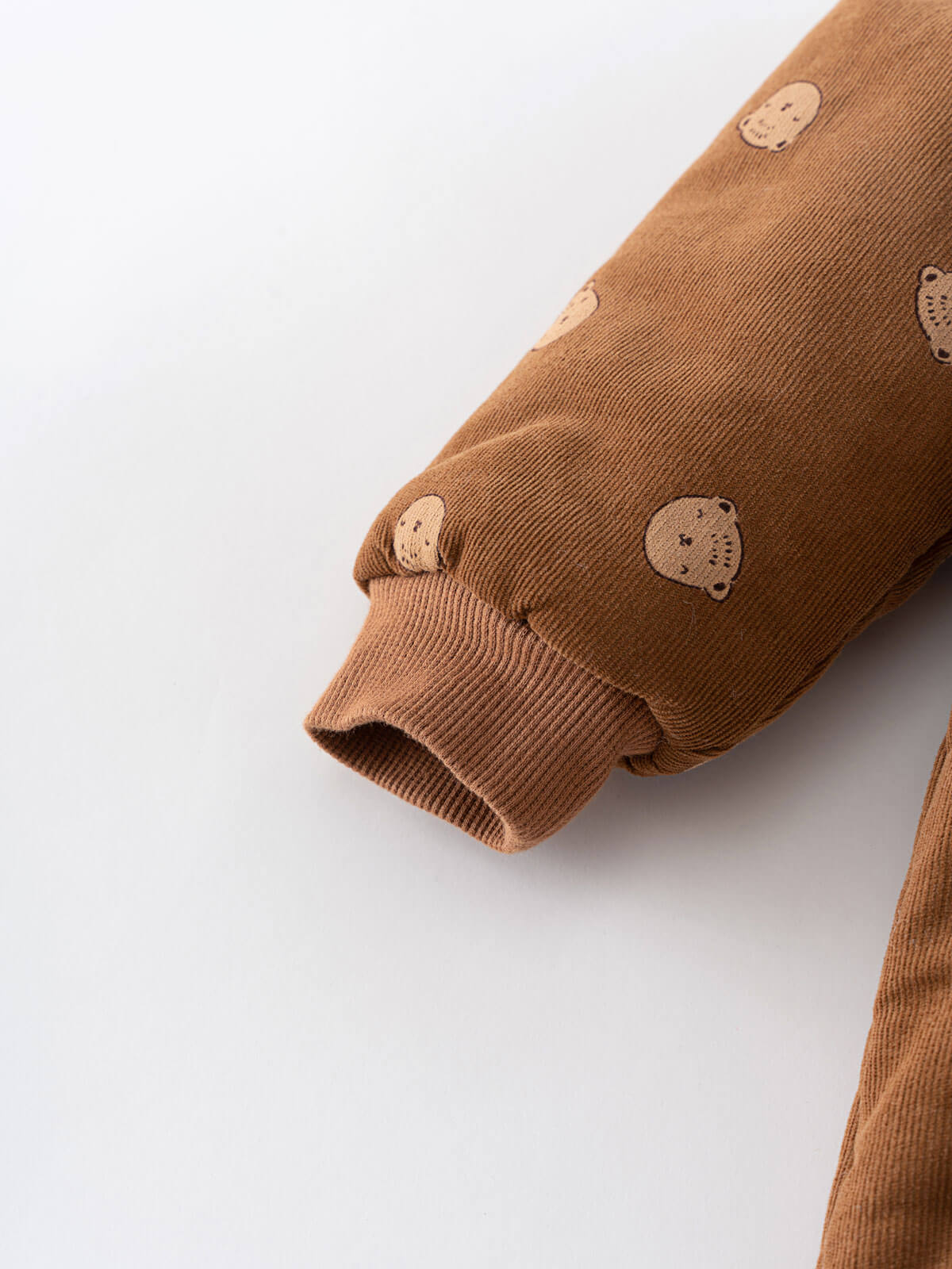 Brown hooded baby pram suit with cream bears on a light gray  Printed Pram Suit - Cosy Bear Russet Baby girl
