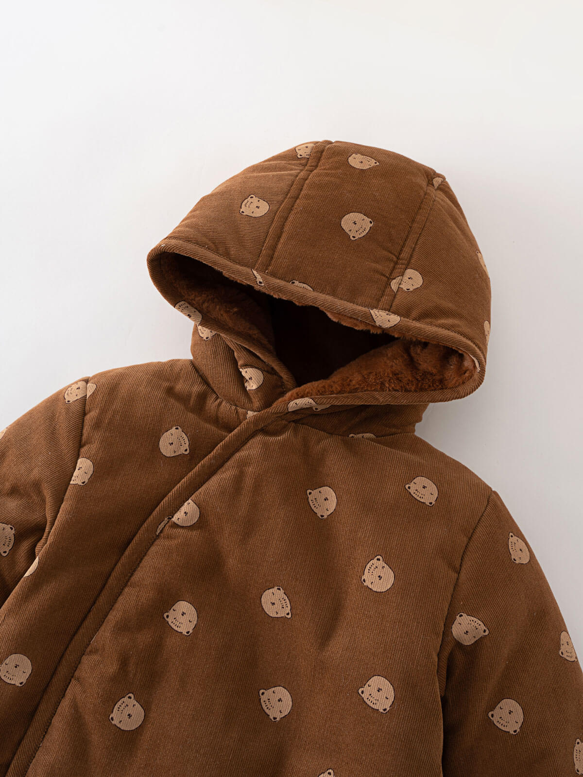 Brown hooded baby pram suit with cream bears on a light gray background Printed Pram Suit - Cosy Bear Russet Baby girl