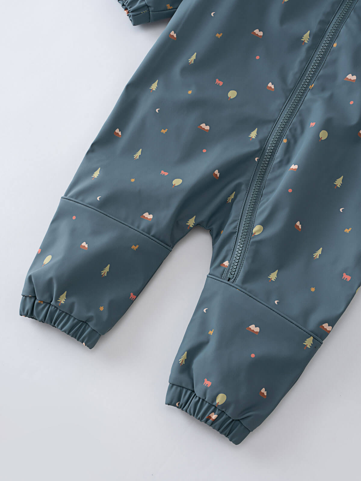 Blue baby rain suit with colorful patterns on a light gray background Printed Puddle Suit - Mountain View Balsam Baby girl
