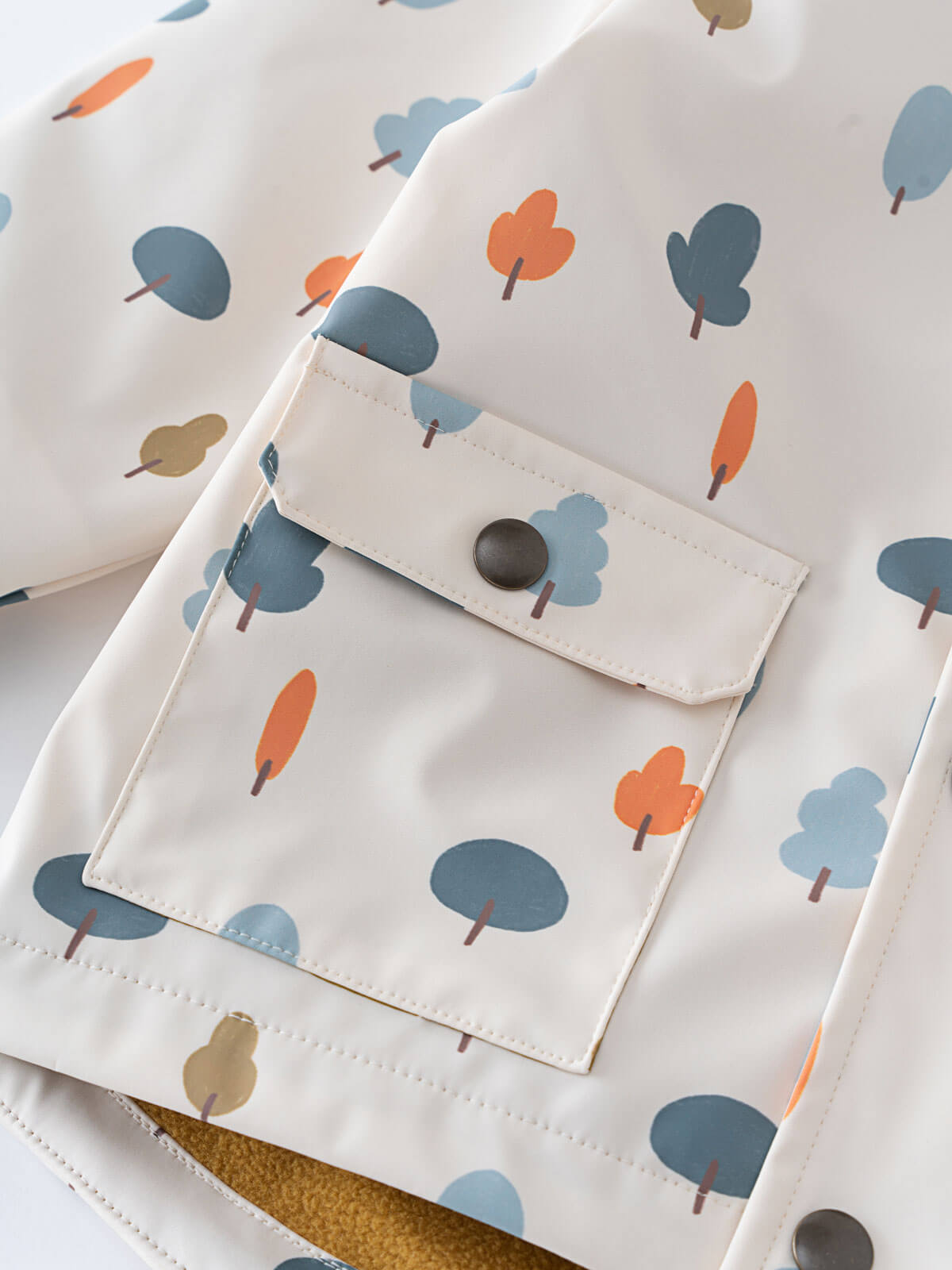 White raincoat with colorful tree pattern and small snap-closure pocket Printed Raincoat - Forest Adventure Ecru Boys