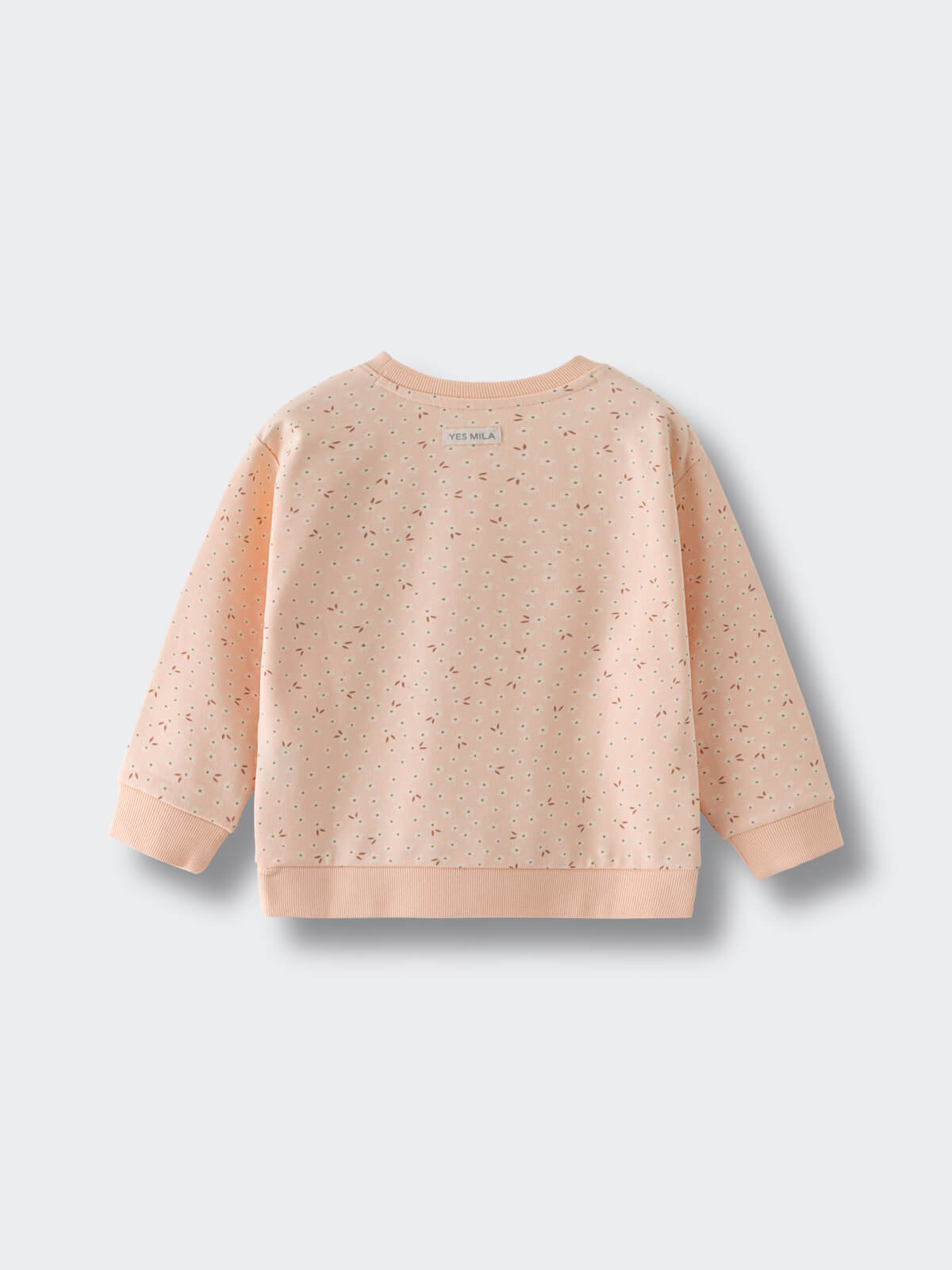 Peach sweatshirt with small floral print pattern laid flat on light background printed Sweatshirt - Flower Power Girls
