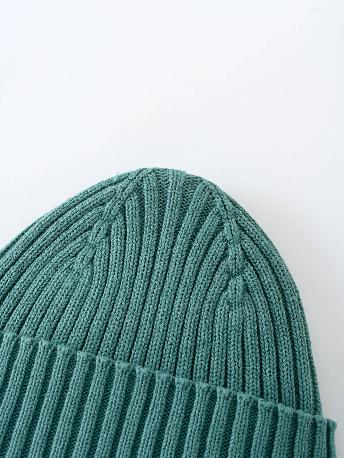 Green knit beanie on a light gray background Ribbed Beanie - Balsam Boys