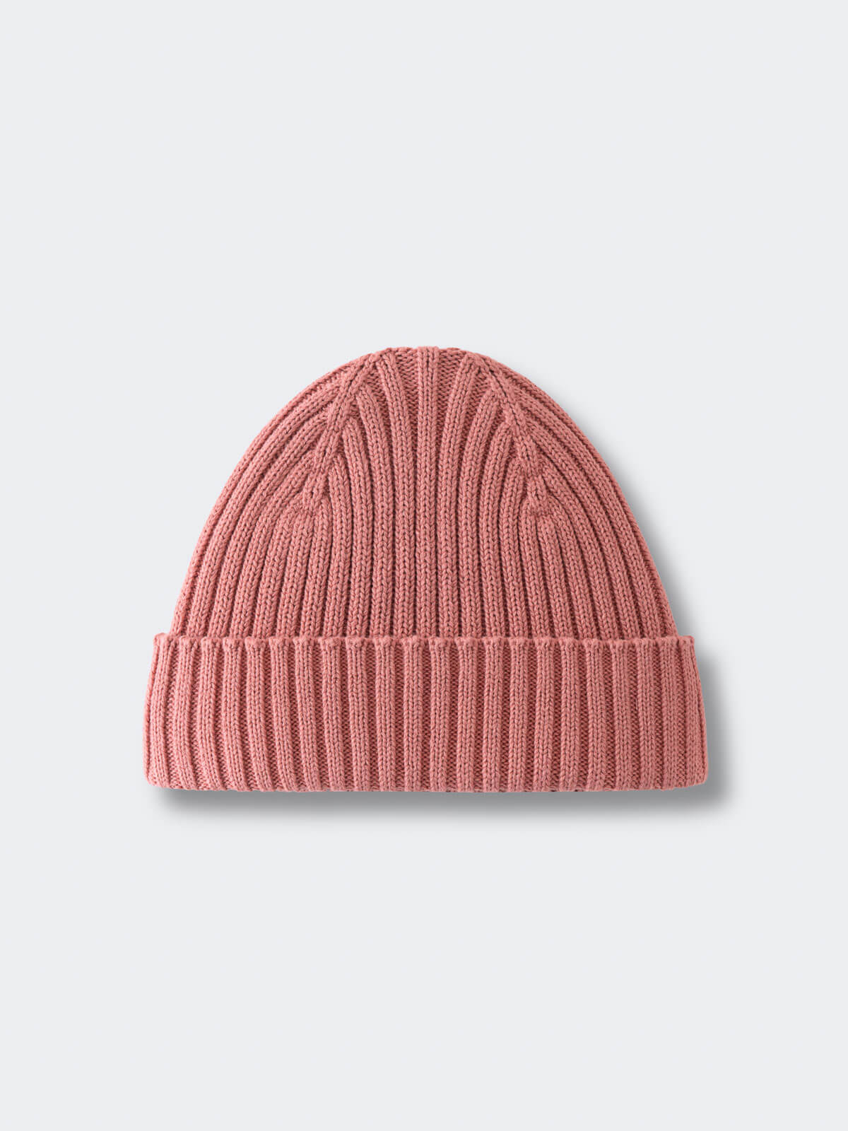 Pink knit beanie on a light gray background Ribbed Beanie - Rosehip Girls
