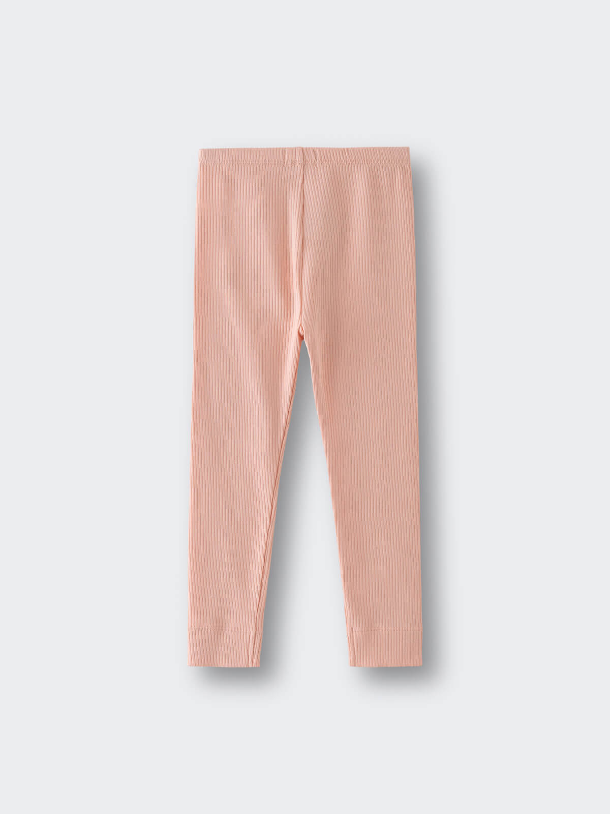 Peach-colored ribbed leggings laid flat on a light gray background Ribbed Leggings - Toasted Peach Girls