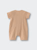 Beige ribbed short sleeve romper laid flat on white surface Ribbed Short Sleeve One Piece - Sand Baby boy