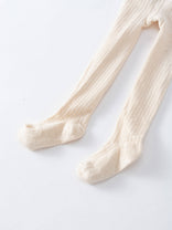 Pair of cream-colored ribbed tights laid flat on white surface Ribbed Tights 2 Pack - Golden Pear/Ecru Girls