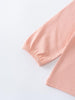 Pink blouse with ruffled details on a light gray background Ruffle Top - Mallow Girls
