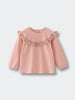 Pink blouse with ruffled details on a light gray background Ruffle Top - Mallow Girls