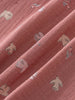 Close-up of pink fabric with small white animal prints Ruffle Woven Blouse - Bird And Blossom Rosehip Girls