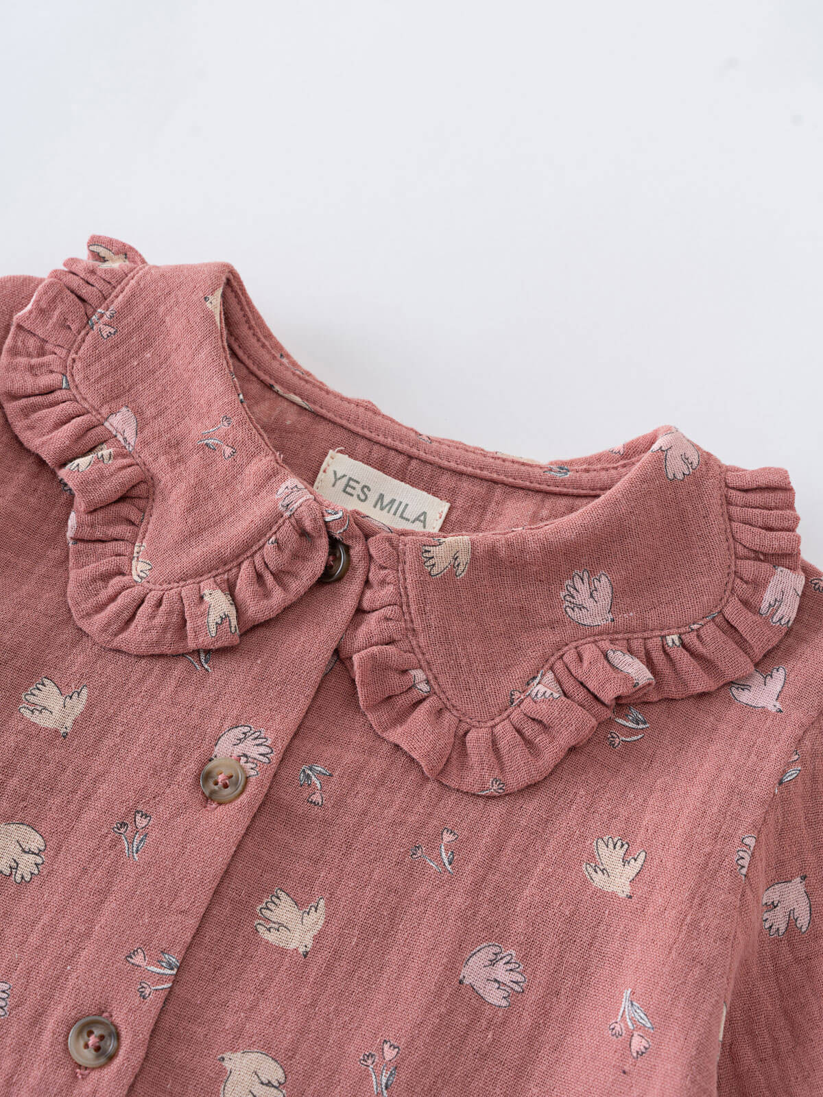 Pink children's blouse with ruffled collar and animal pattern on a white background Ruffle Woven Blouse - Bird And Blossom Rosehip Girls